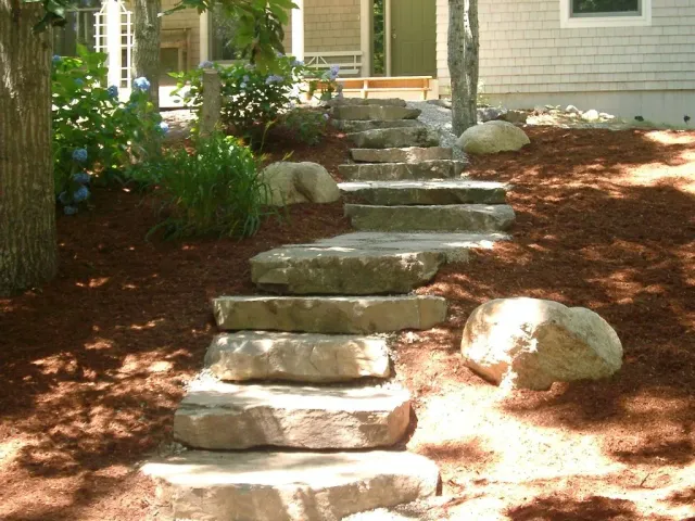 A set of stone steps leading up to a house