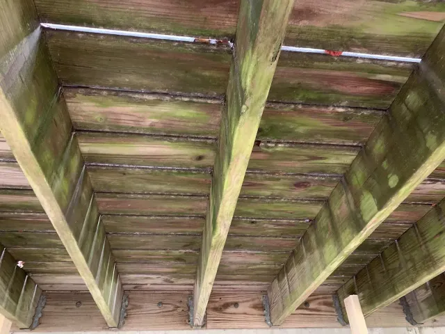 cleaning under a deck