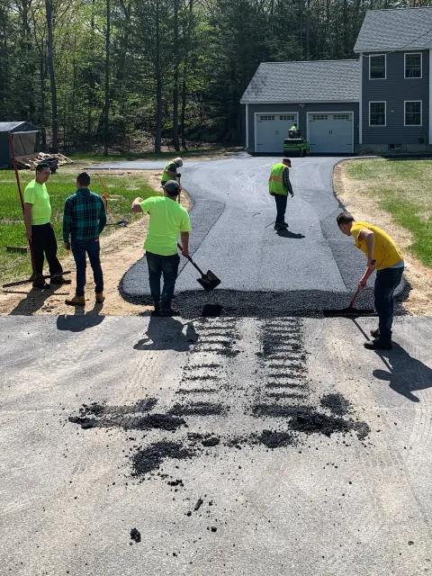 Residential Driveway Resurfacing:  Revitalize your home's entrance with Young's Hot Top Paving's expert residential driveway resurfacing.