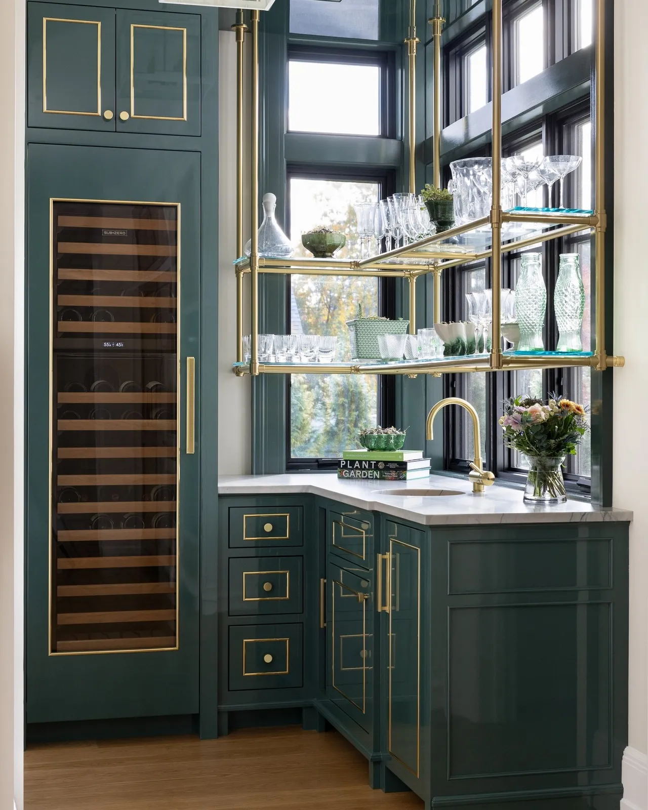 Rich green cabinetry and precise brass detailing give this compact space an unmistakably custom feel. From the integrated wine storage to the tailored cabinet fronts and trim work, the millwork was designed to make every inch feel intentional.
Cabinetry: Fallon Fine Cabinetry
Interior Designer: @tastedesigninc 
Photographer: @emilyobrienphoto_design 
Architect: @slocumhalldesign 
#ButlersPantry #CustomCabinetry #CustomMillwork #LuxuryKitchen #LuxuryInteriors #GreenCabinetry #CabinetryDesign #ArchitecturalMillwork #BespokeInteriors #LuxuryHomeDesign #CustomHomes #KitchenInspiration #InteriorDetails #FineWoodworking #HomeBarDesign #PantryDesign #CustomBuilder #MassachusettsBuilder #NewEnglandHomes #InteriorInspiration