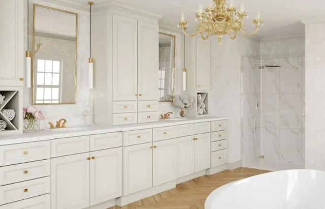 A bathroom with a bathtub , sink , mirror and chandelier.