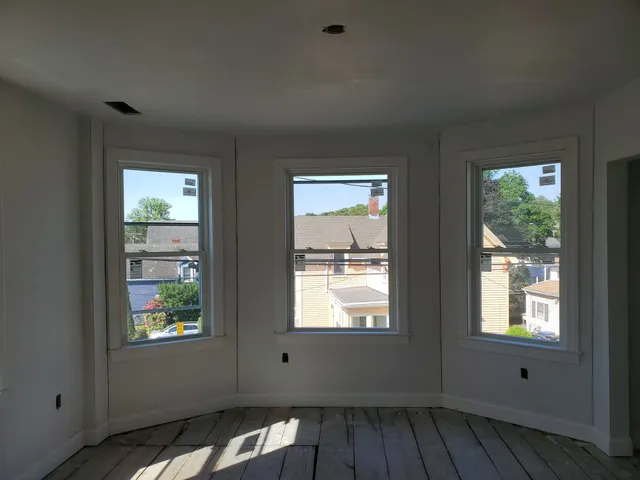Skim-coat plaster finish by Boston Strong Plastering, MA