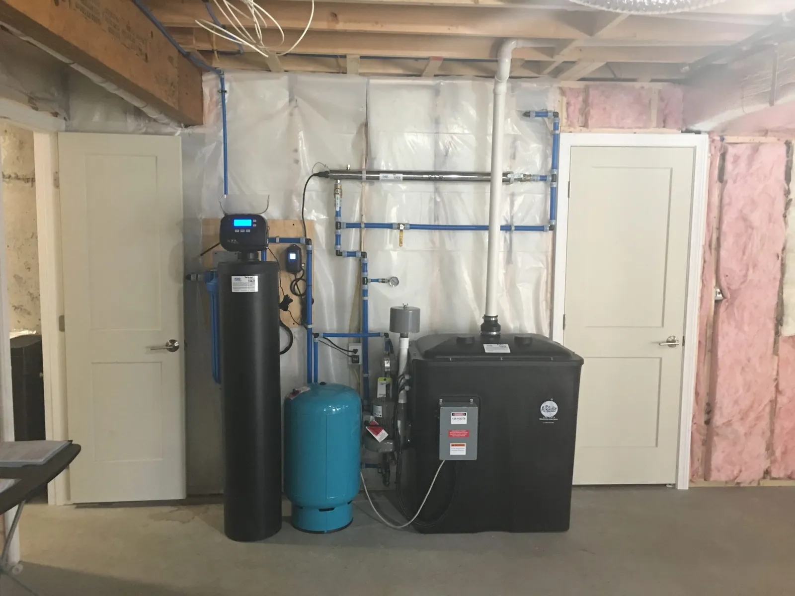 From right, Radon in water removal system with pressure tank (blue) and 1 1/2 cubic feet high efficiency Water Softener. 20