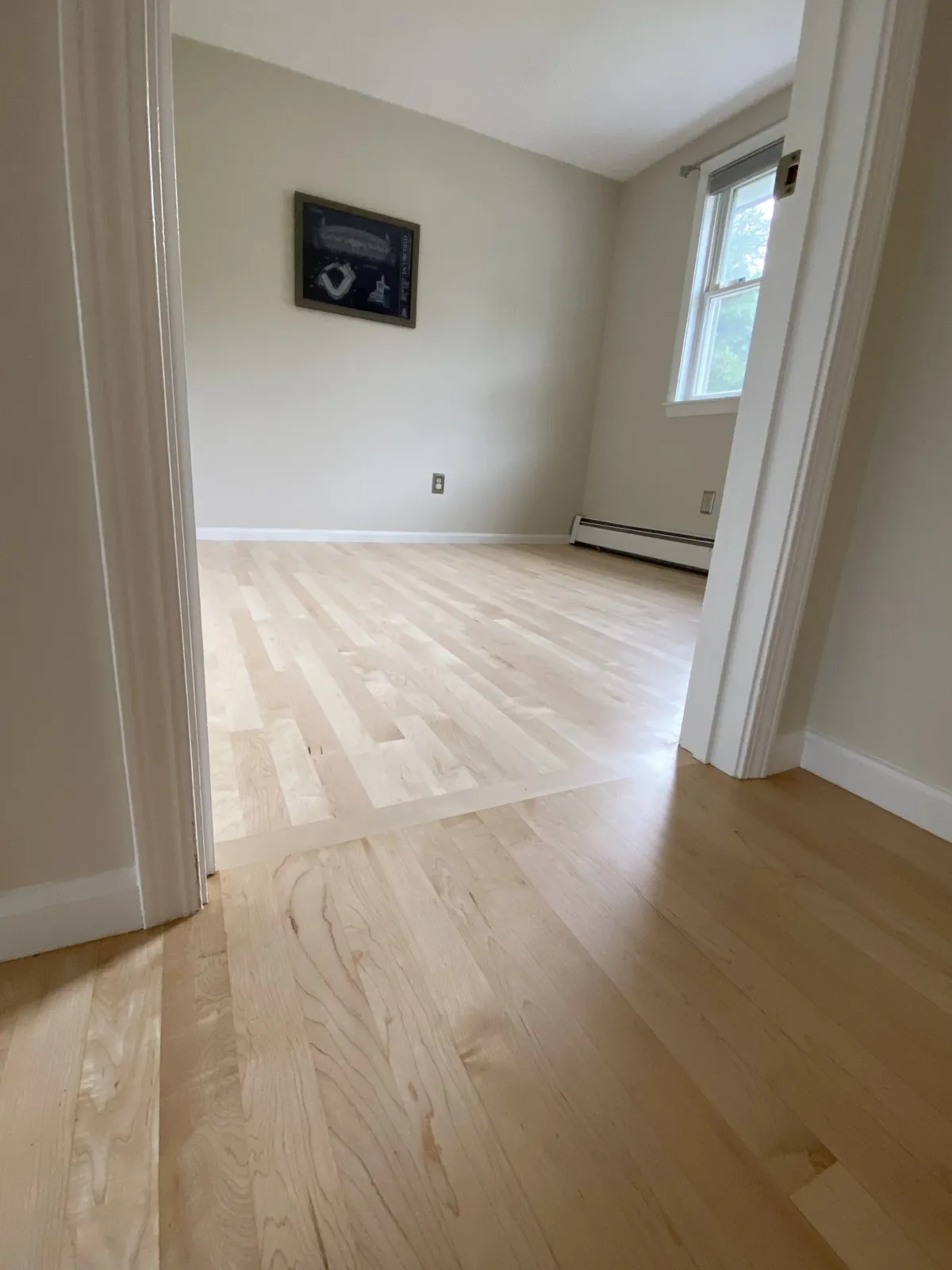 New maple floor between rooms