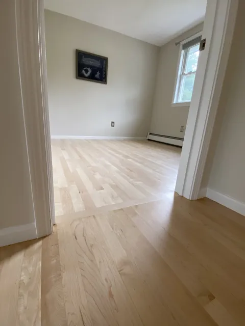 New maple floor between rooms
