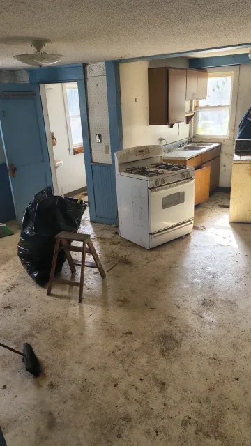 The same space cleared after the full property cleanout