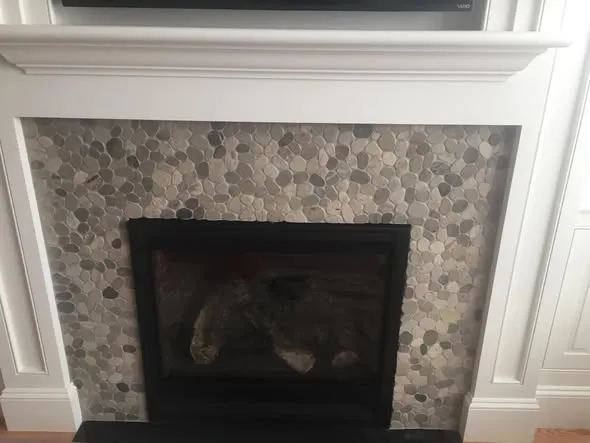 Mosaic tile fireplace surround