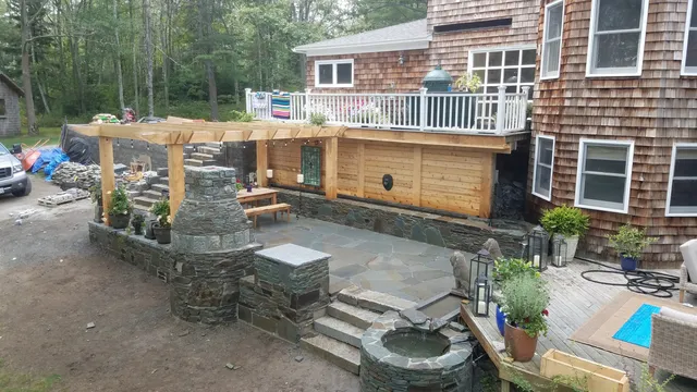 Backyard oasis with multiple waterfalls and basins