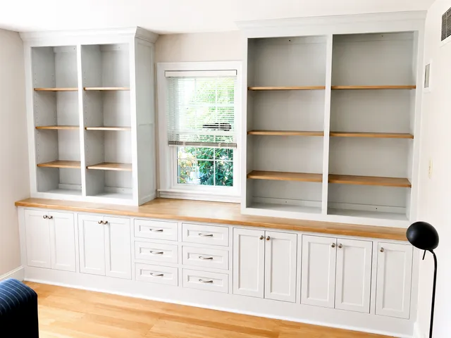 Custom built-in cabinetry and shelving crafted by KBK Woodworking