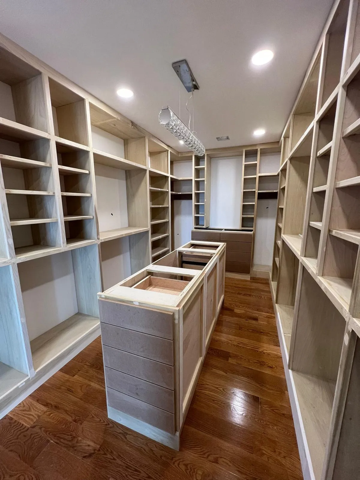 Custom walk-in closet, built-ins scribed to the field