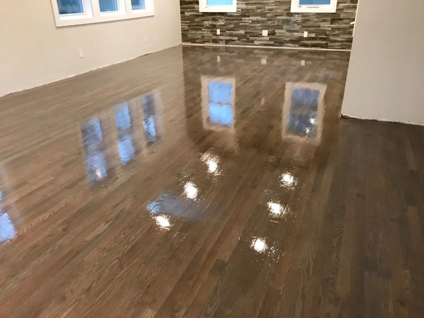 Freshly refinished floor with glossy finish
