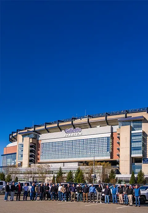 The Door Systems teams in front of the Gilette Stadium.