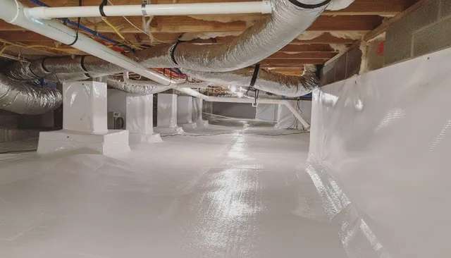 Crawl space with vapor barrier encapsulation installed