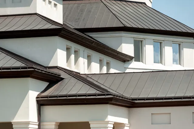 A house with beautiful metal roof.