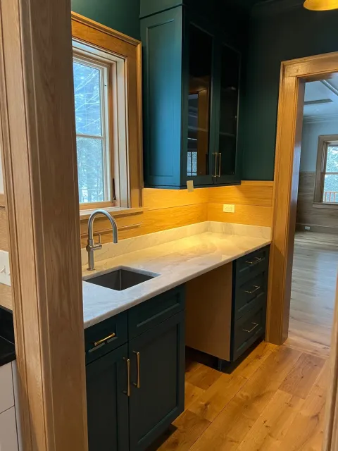 Deep green cabinetry