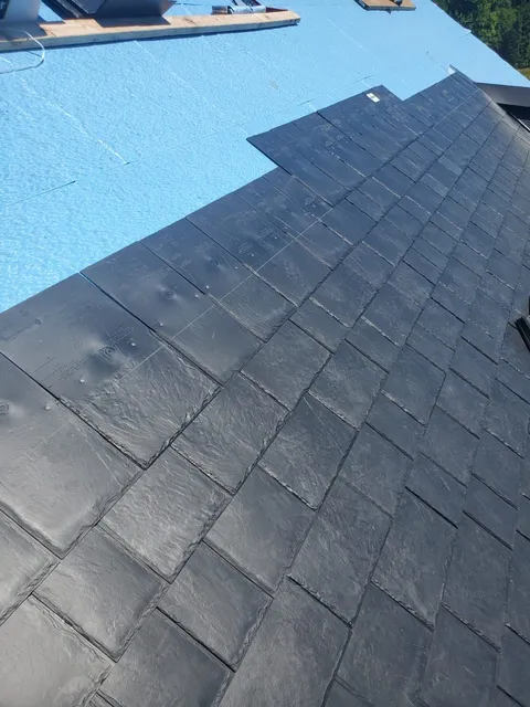 work photo from newroofingandsiding.com