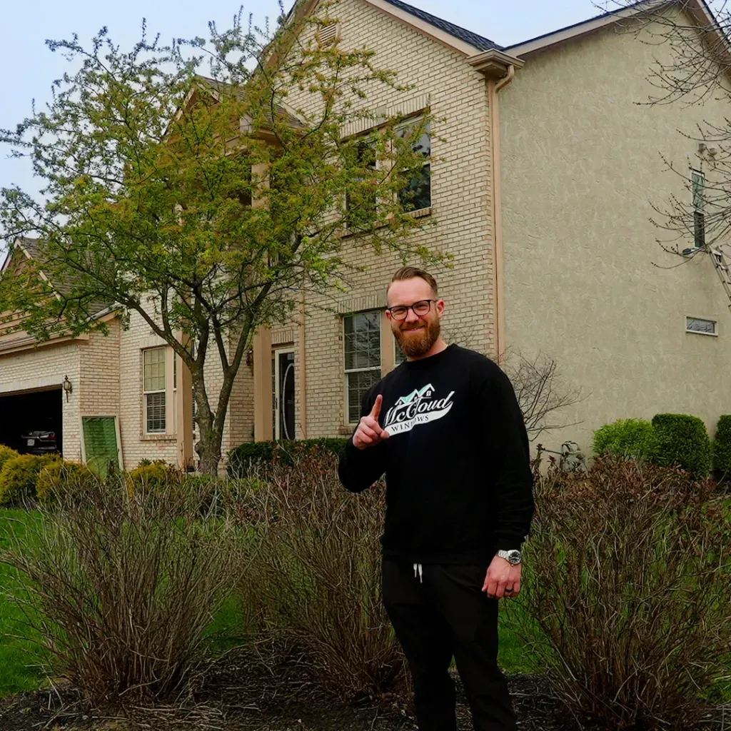 owner of virtual view windows standing behind of a finished window replacement service