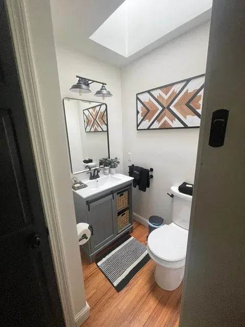 Spotless modern bathroom cleaned by Brighter Days — house cleaner near Sebago Lake Maine