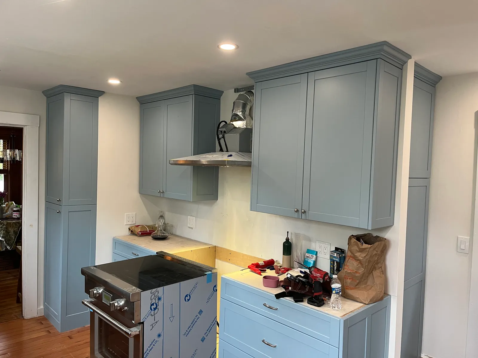 Kitchen with under-cabinet and ceiling lighting