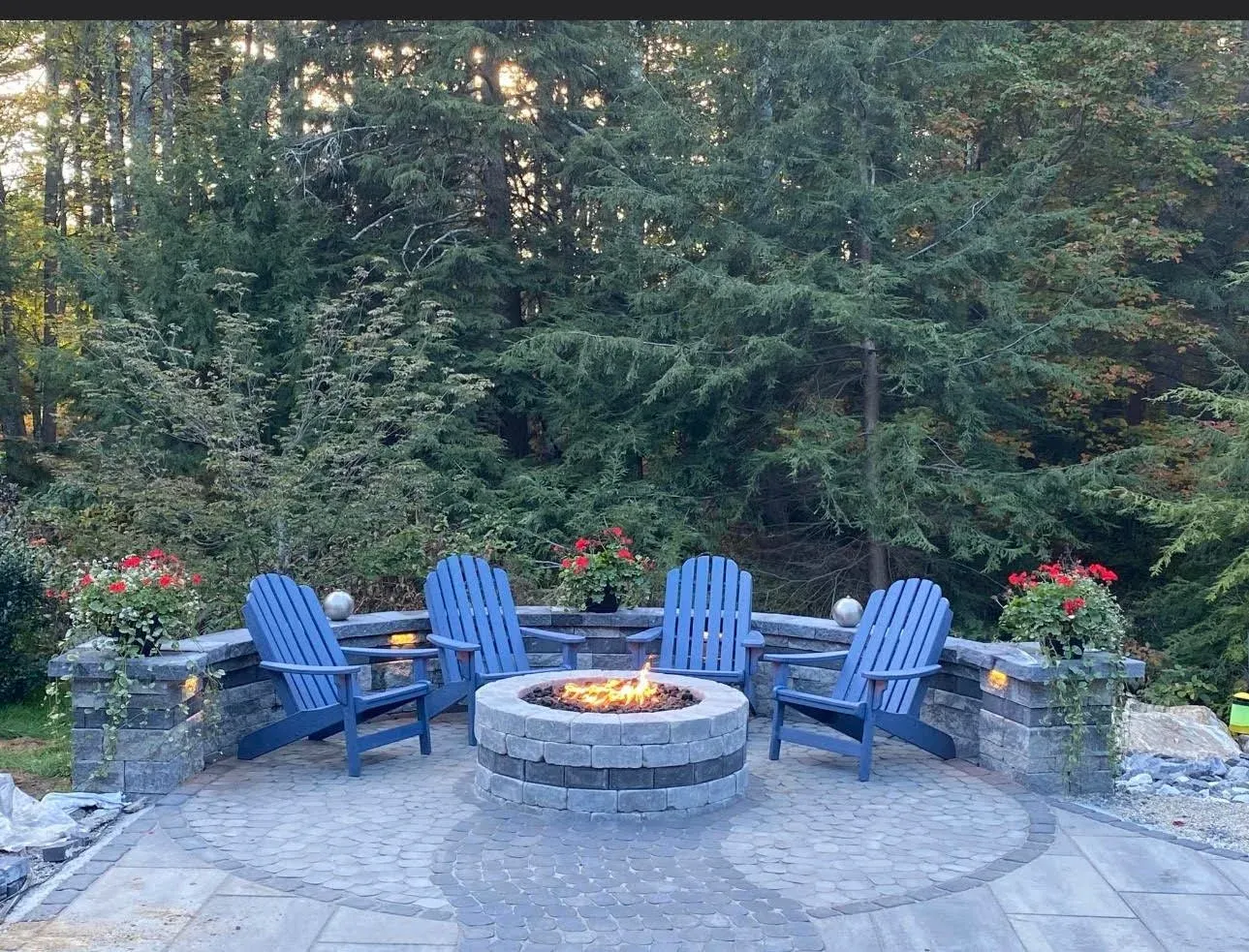 Landscape design with paver patio and fire pit in Nashua, NH