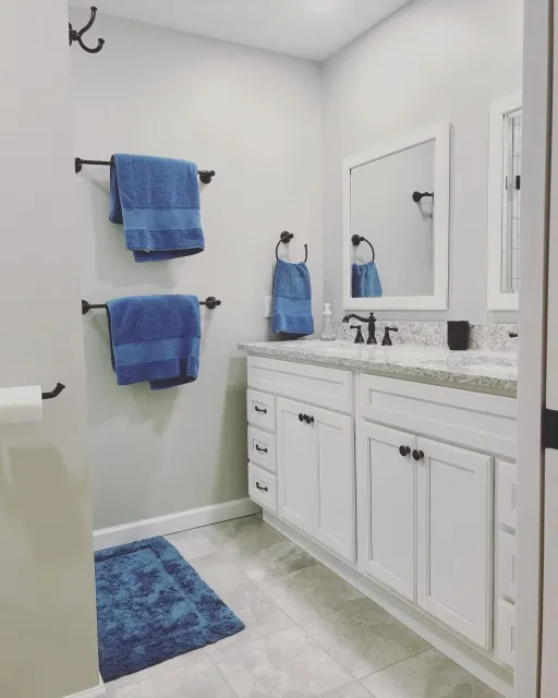 Bathroom renovation for repeat clients in Hanover, NH. Drywall install, tile install, trim install, interior painting, and new vanity!