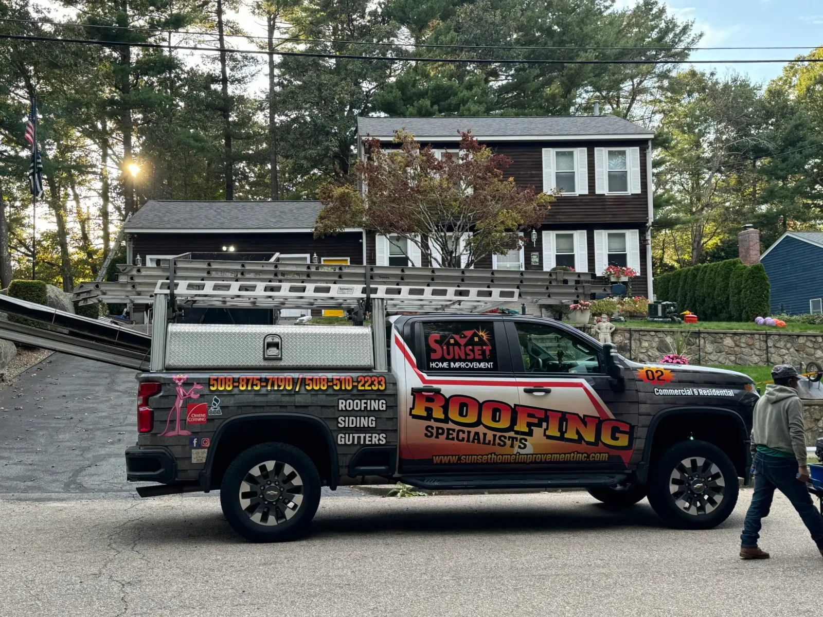 Sunset Home Improvement roofing crew on site in Easton MA