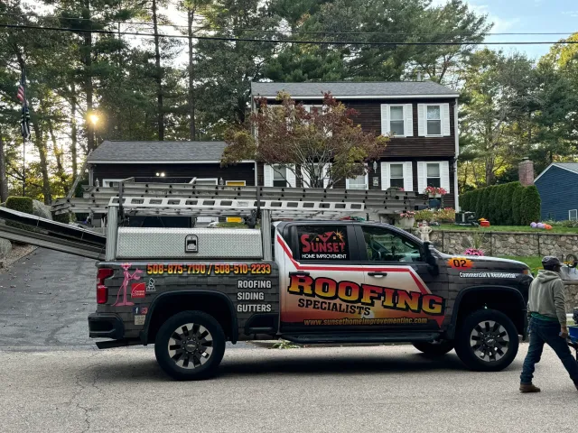 Sunset Home Improvement roofing crew on site in Easton MA