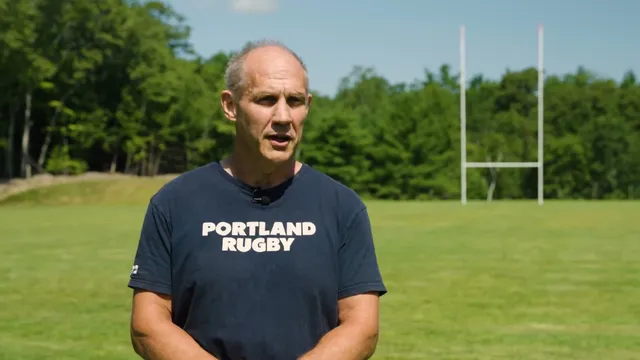 Dominic Tracy of Portland Rugby standing on the finished championship field