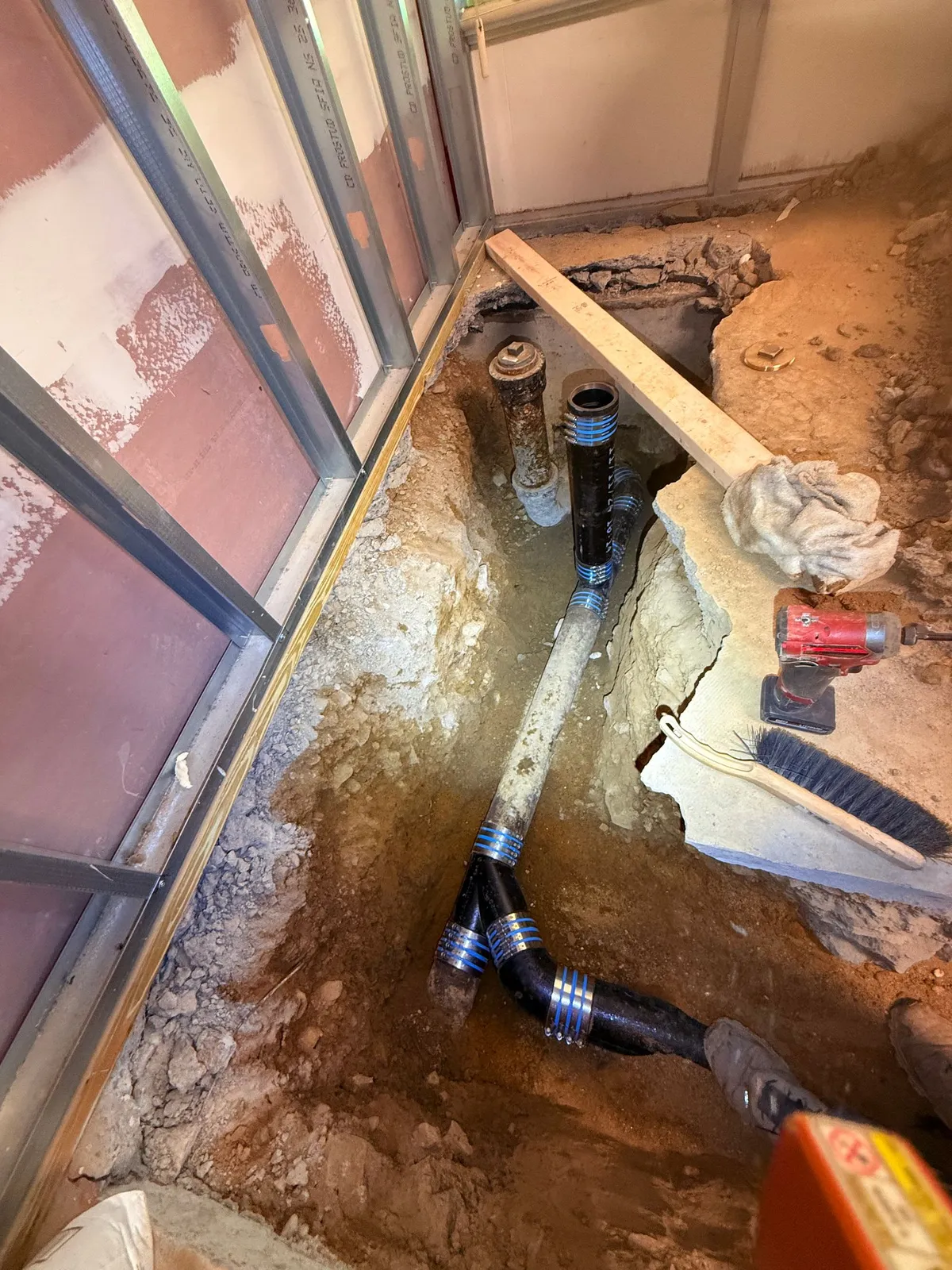 Under-slab drain replacement in progress