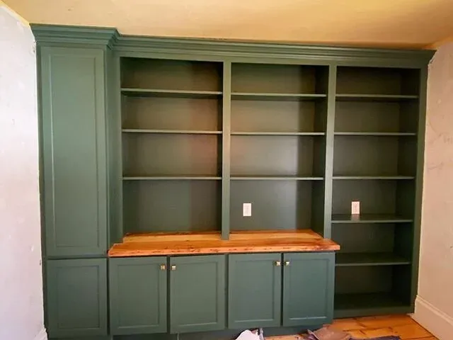 Loving this bold color for this home office. The reclaimed counter ties in well the original flooring for this old farmhouse makeover. DM us to see what we can do for your home office or any custom project!