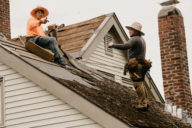 Storm damage roof repair documented for insurance claim, Quincy MA