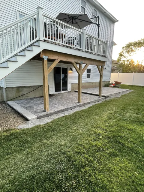 Large two-tier limestone patio built by The Englishmen Masonry in Portsmouth, NH