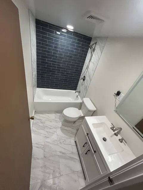 Black Tile Bath — photo 1