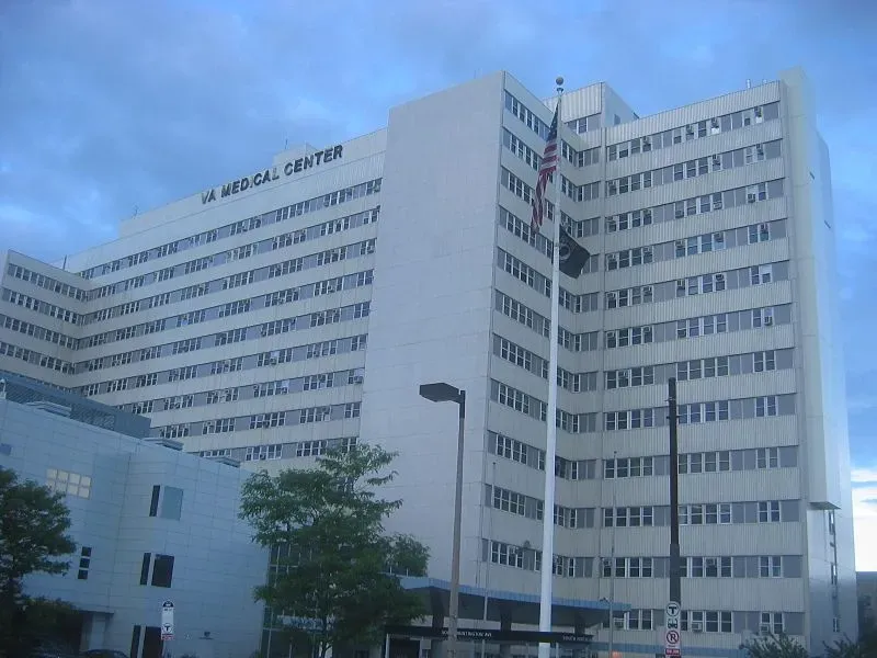 Large, white hospital building with