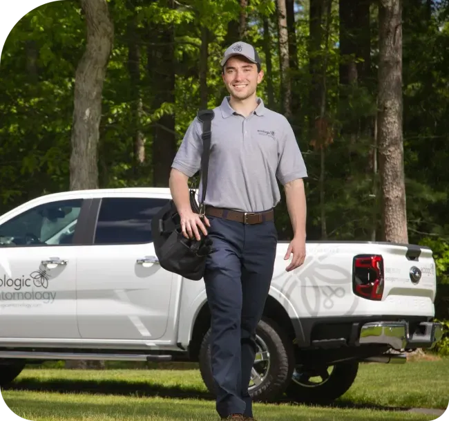Service technician walking in front of truck