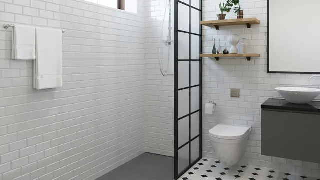 Modern bathroom with subway tile shower and black-frame divider