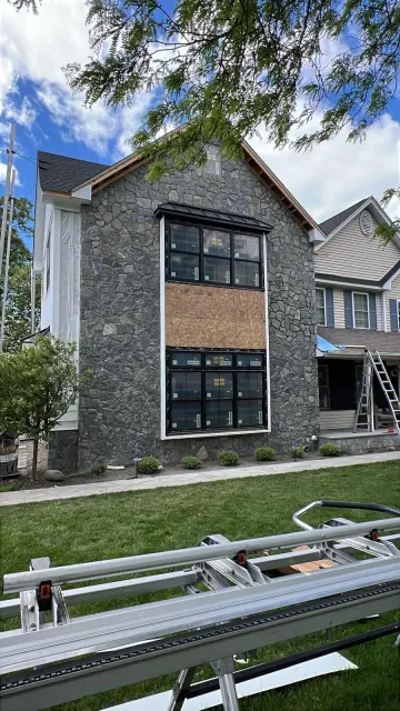 Stone facade on a residential construction project in progress