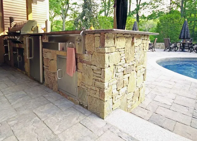 Columned outdoor kitchen pavilion