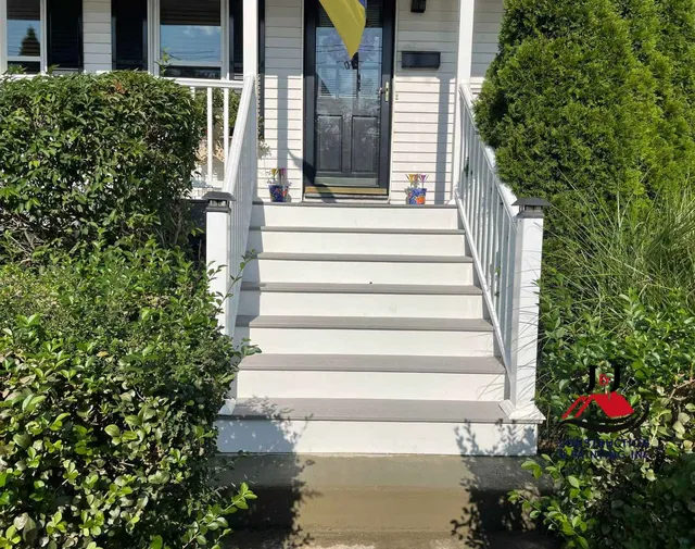 New composite front steps with white railing
