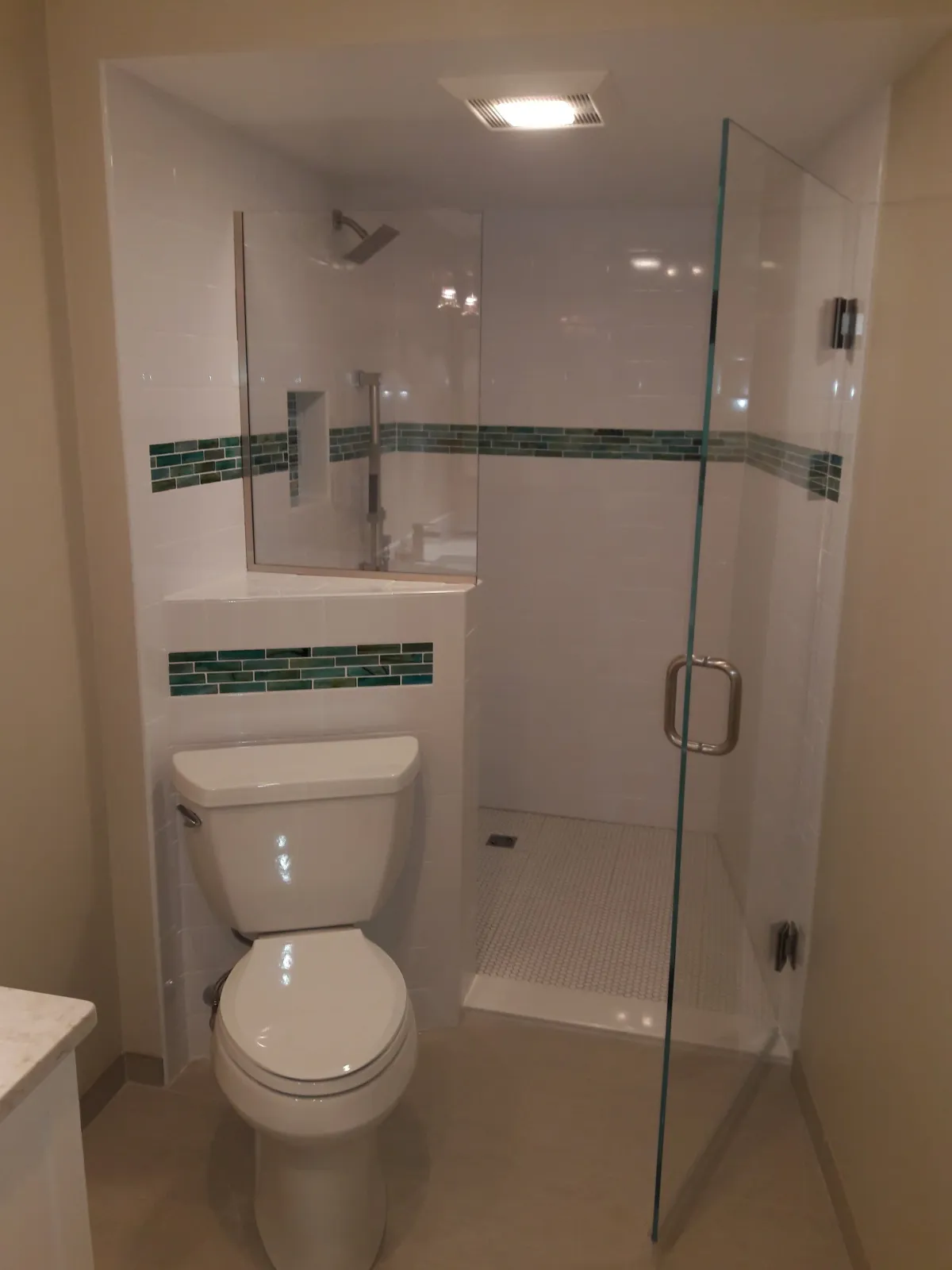 Spacious Walk-in Shower with Niche and Easy Access Controls