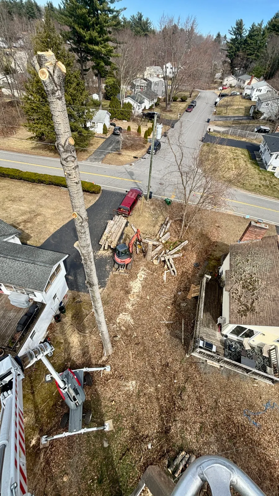 new england tree service aerial lift in limited access area