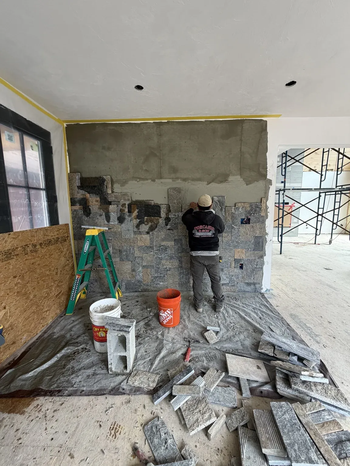 interior stone veneer masonry installation in Waltham Massachusetts