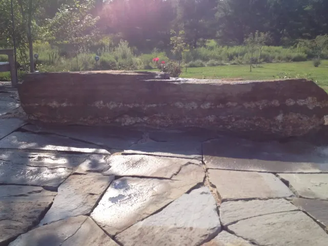 Stone Bench with rough natural stone patio