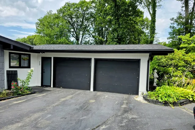 Sleek Black Seamless Gutter Installation in Leominster, MA