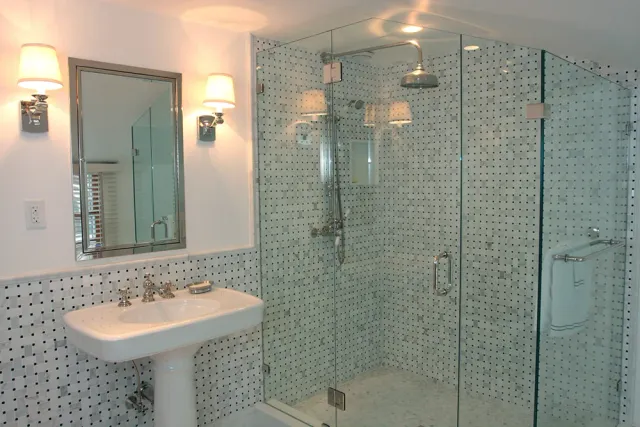 Renovated bath with tiled shower enclosure