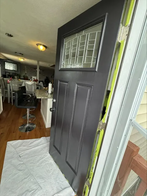 Kitchen painting service showing freshly painted walls and protected cabinets in a Waltham, MA home