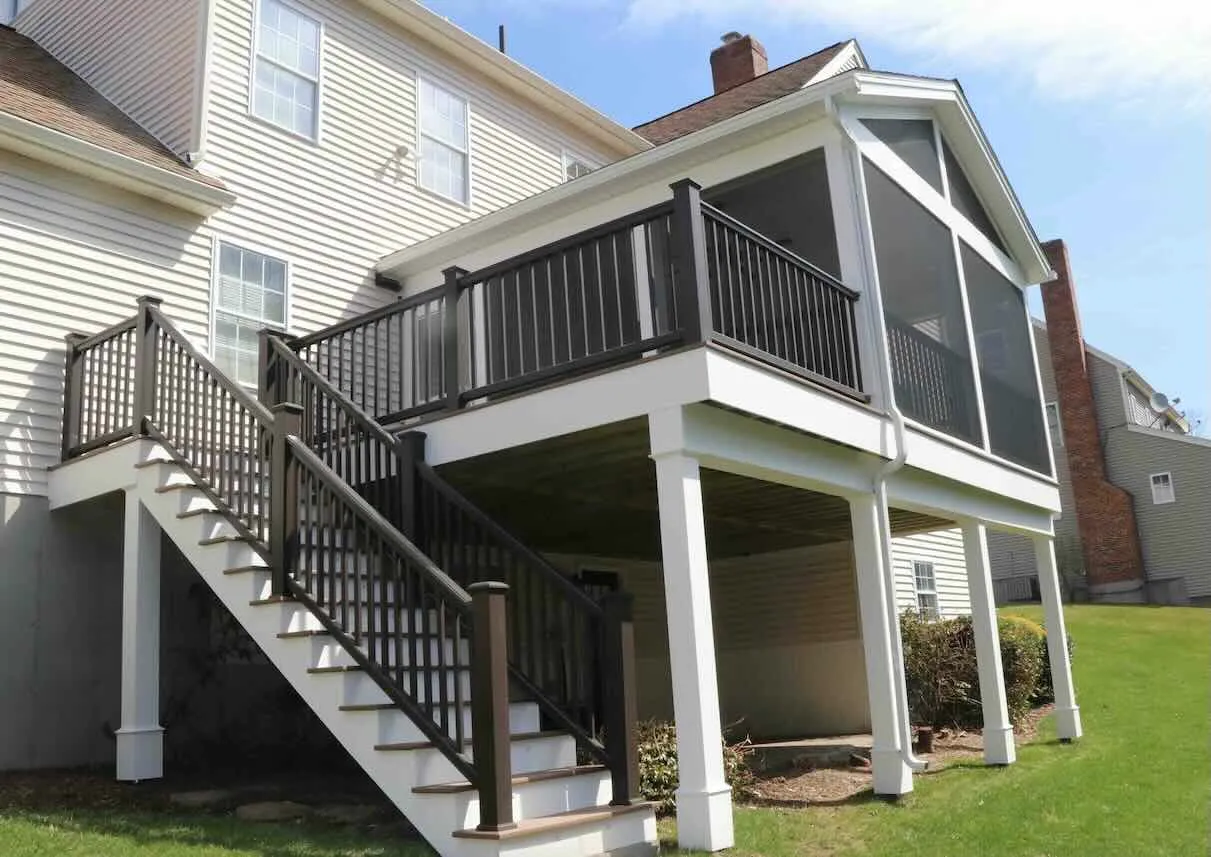 screened-in-porch-on-the-residential-under-deck-with-black-railing-in-worcester-ma.jpg