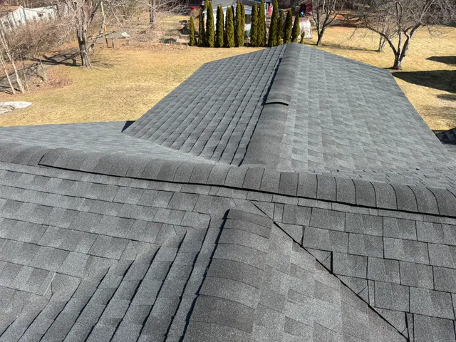 Finished roofing project showcasing clean flashing details and professional craftsmanship