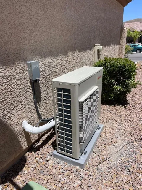 Residential air conditioning condenser unit in Norwood