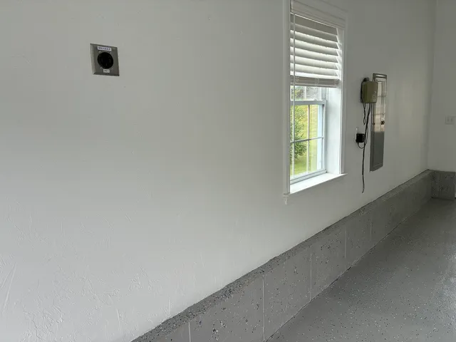 Garage prepared for Level 2 EV charging with 240V NEMA 14-50 receptacle